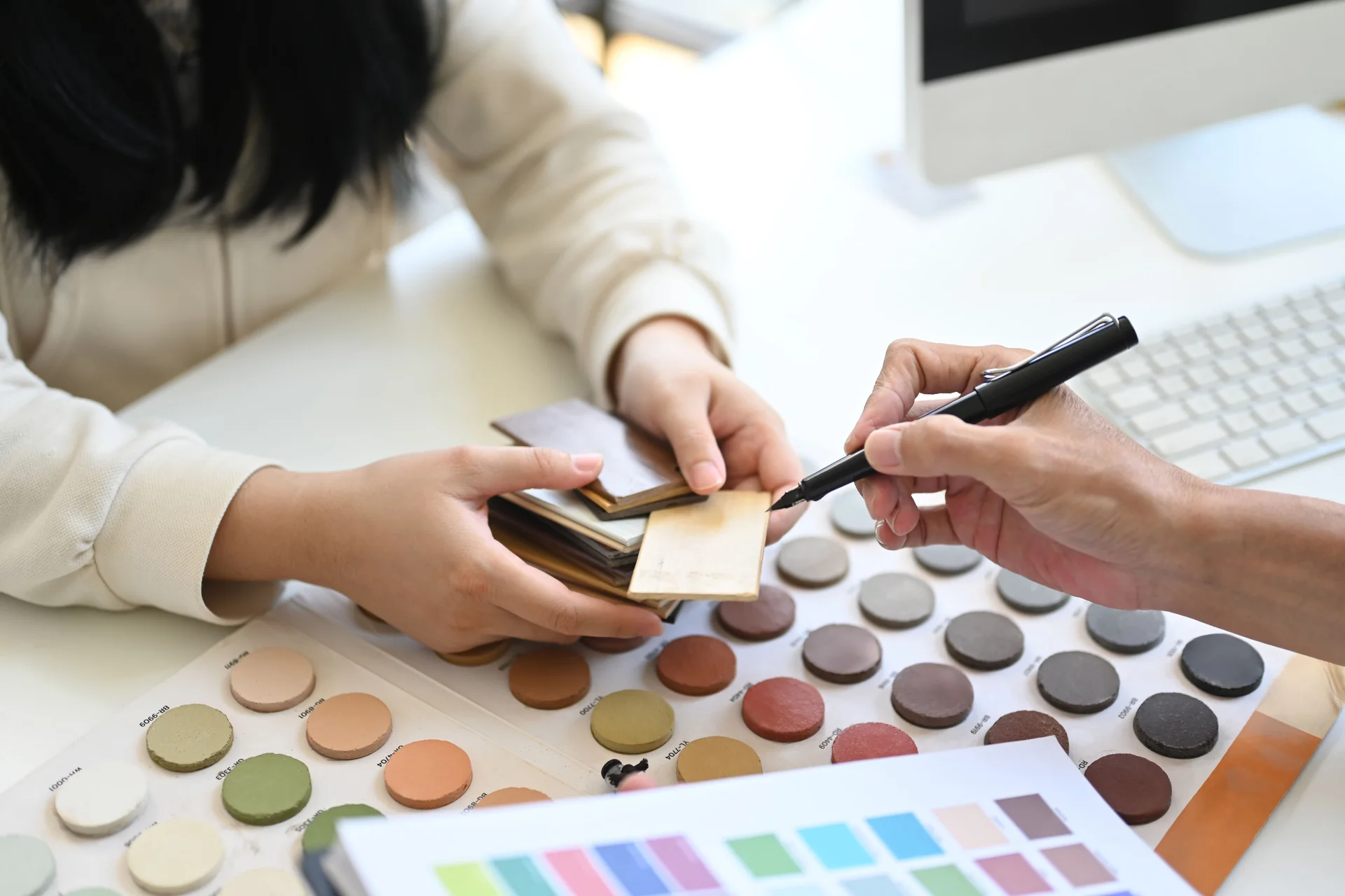 Selecting wood finishes and hardware samples for custom closet design